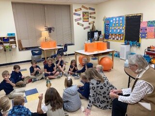 Students of Our Lady of Snows School in Mary’s Home gather in a circle in their classroom to pray for peace in the Holy Land.